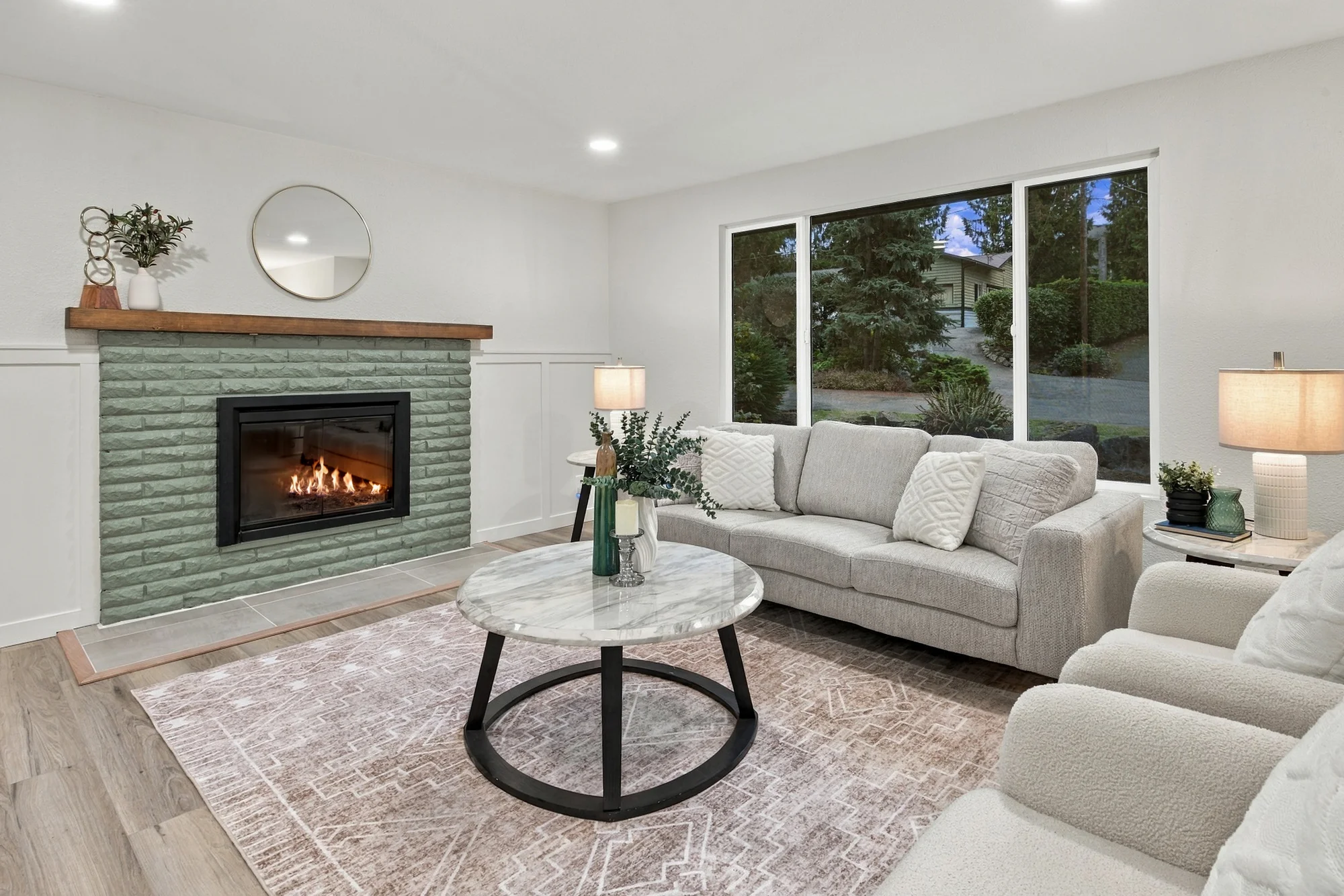 Light-filled living room with a wood-burning fireplace