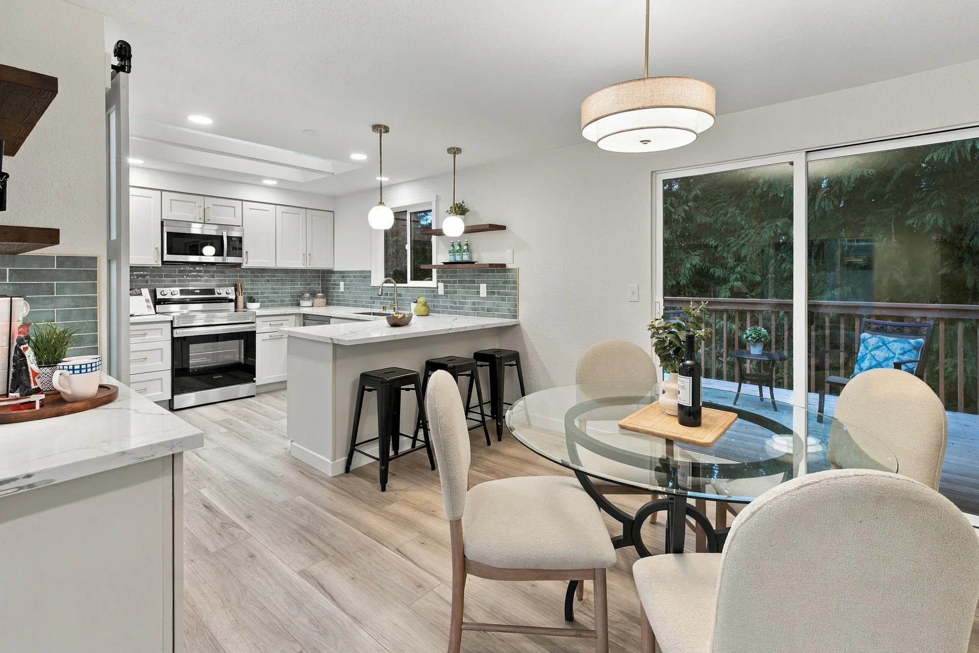 Dining room connecting the kitchen and private deck