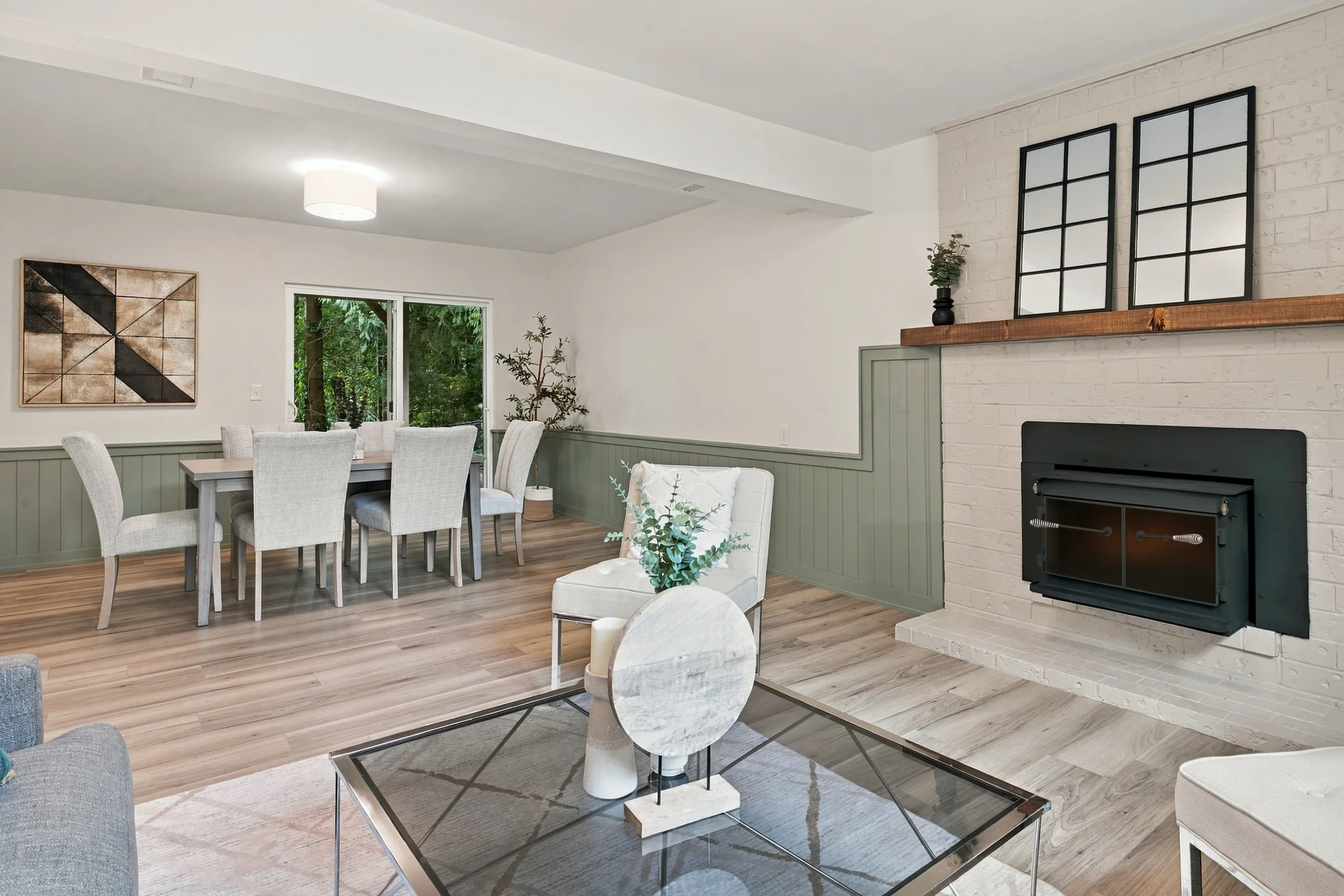 Recreation room with a wood-stove insert and space for a table