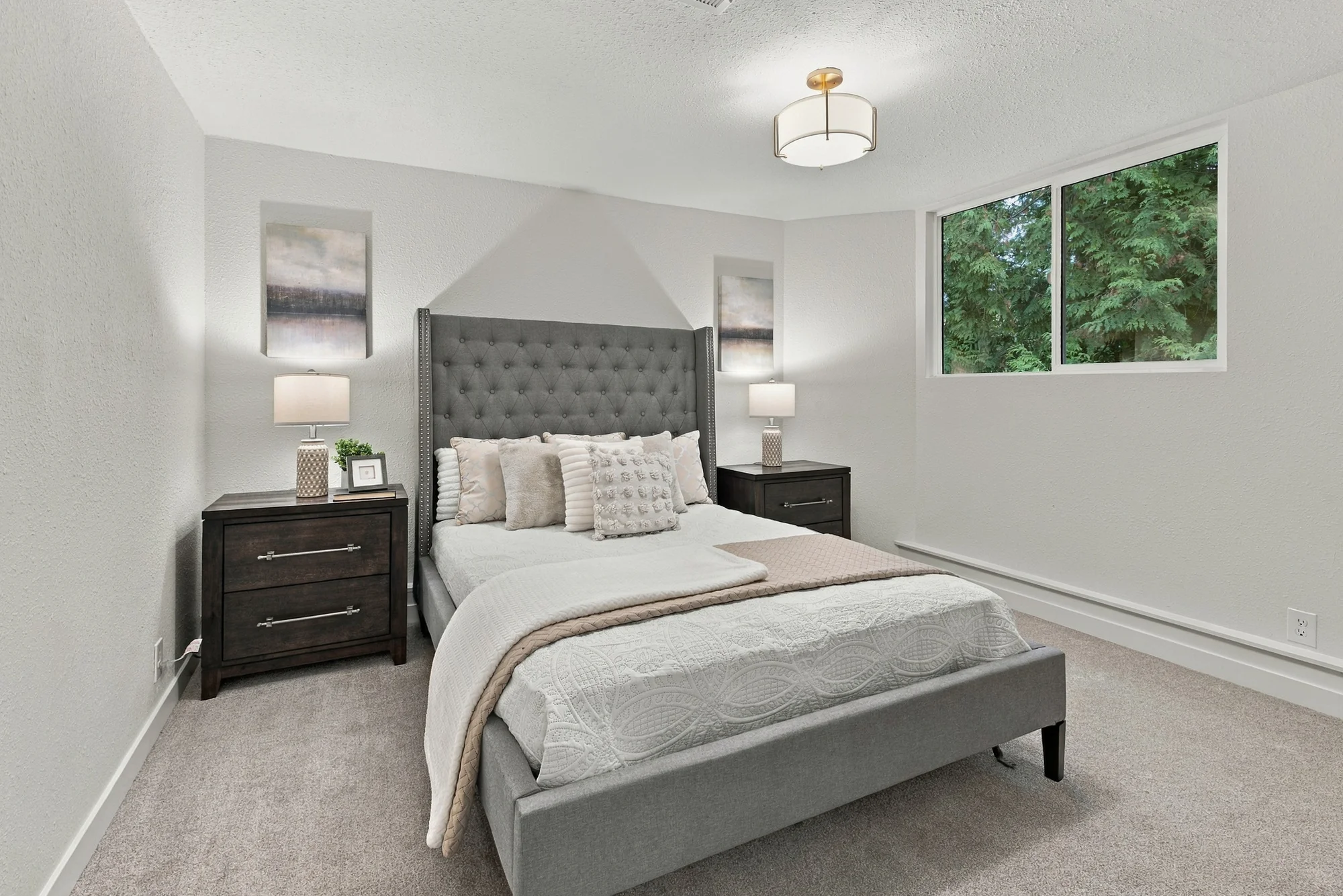 Lower-level office / den pictured with bedroom furnishings